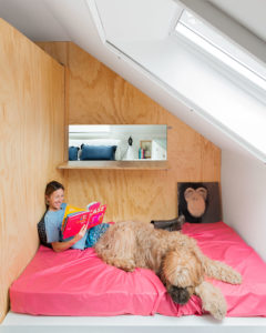Margherita Vaghi and her dog in a bed Photographer Maria Teresa Furnari