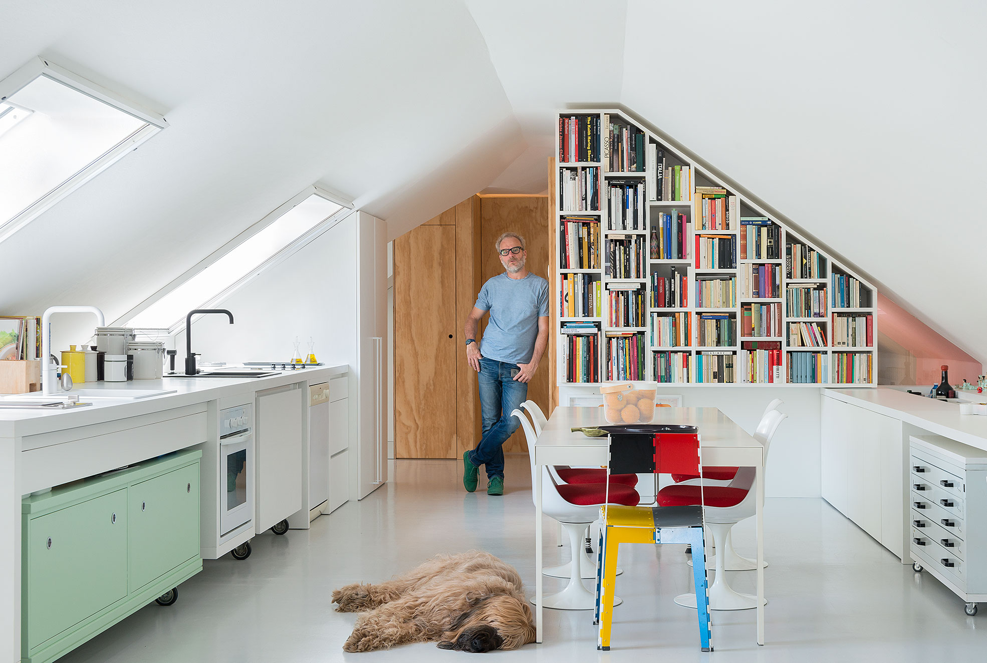 Alessio Riva Architect and his dog in his kitchen Photographer Maria Teresa Furnari