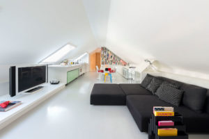 Living room and Kitchen in an attic apartment Photographer Maria teresa Furnari