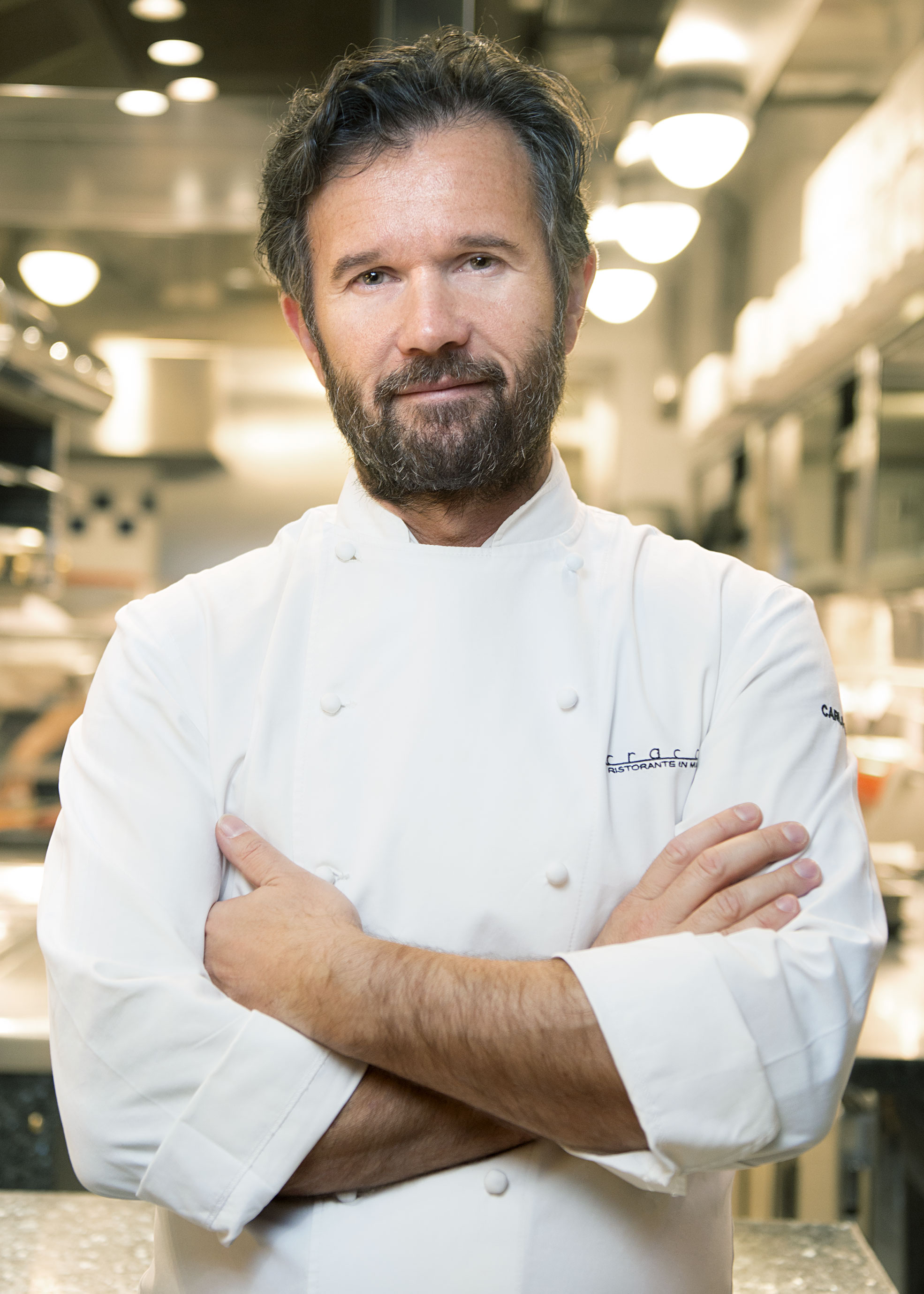 Portrait of Chef Carlo Cracco in the kitchen Photographer Maria Teresa Furnari