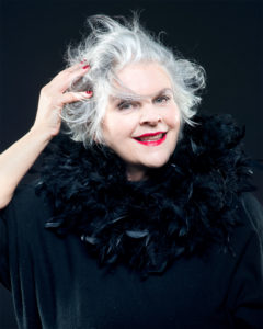 Portrait of an elderly woman with mussed white hair Make Up By Daniele Francolino Photographer Maria Teresa Furnari